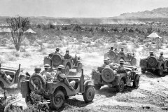 Apr. 20:  U.S. Army troops during training in California desert. Photo published in Times on May 3, 1942.